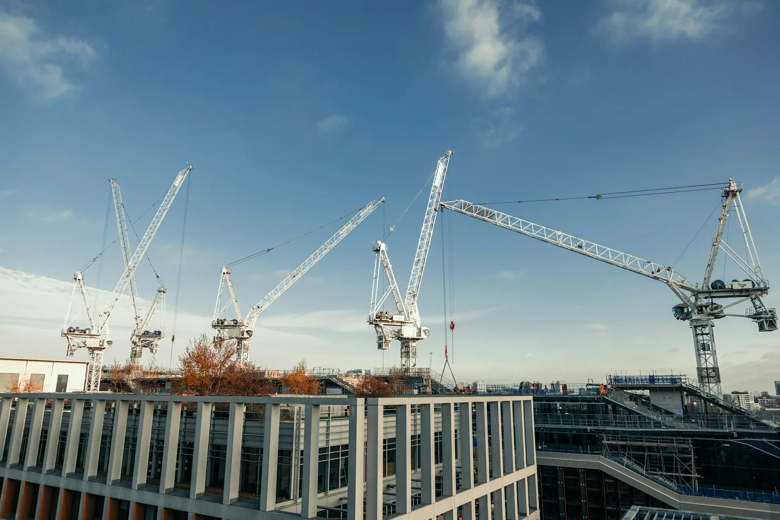 Tower cranes over a development site